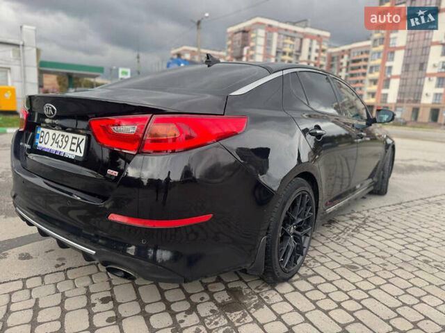 Черный Киа Оптима, объемом двигателя 2 л и пробегом 280 тыс. км за 9750 $, фото 9 на Automoto.ua