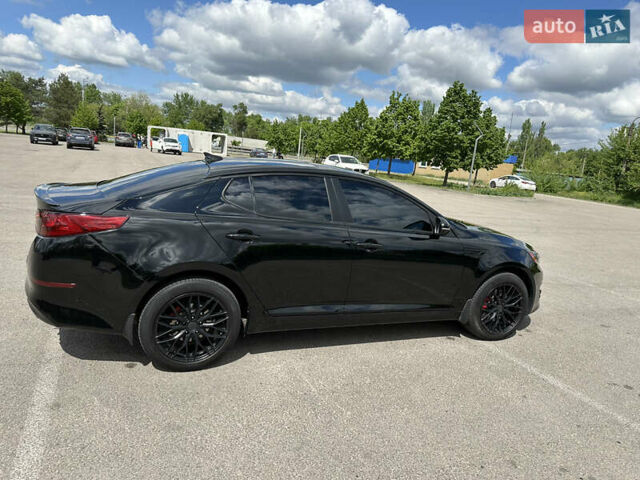 Черный Киа Оптима, объемом двигателя 2 л и пробегом 180 тыс. км за 13300 $, фото 3 на Automoto.ua