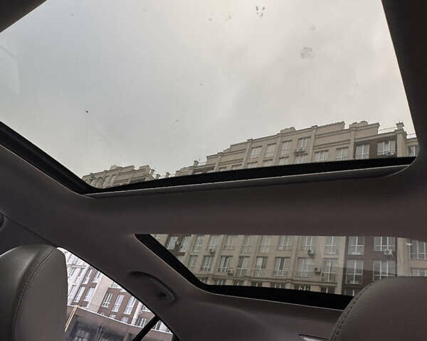 Черный Киа Оптима, объемом двигателя 2.4 л и пробегом 127 тыс. км за 10600 $, фото 6 на Automoto.ua