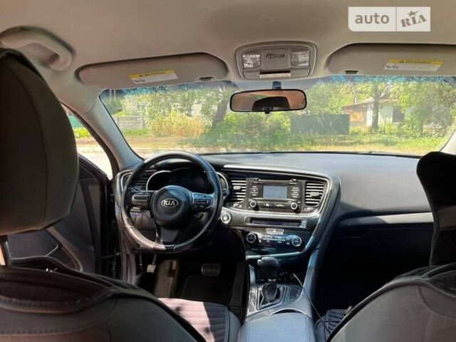 Черный Киа Оптима, объемом двигателя 2.36 л и пробегом 265 тыс. км за 11000 $, фото 7 на Automoto.ua
