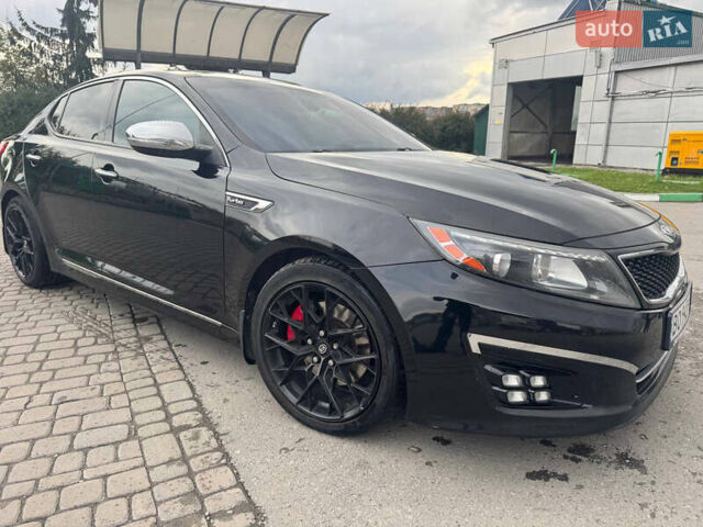 Черный Киа Оптима, объемом двигателя 2 л и пробегом 280 тыс. км за 9750 $, фото 4 на Automoto.ua