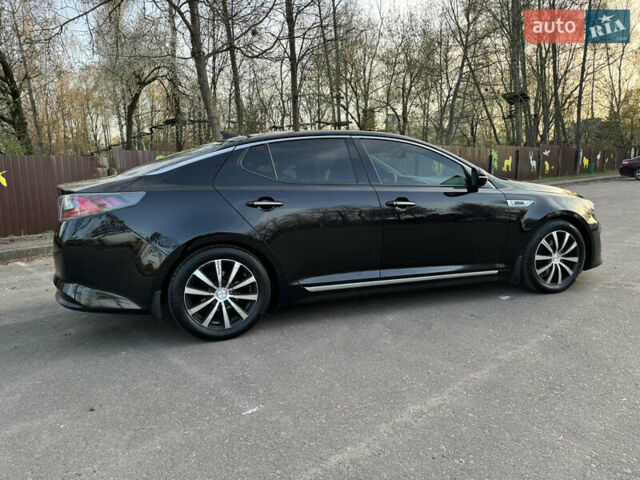 Черный Киа Оптима, объемом двигателя 2.36 л и пробегом 163 тыс. км за 10600 $, фото 4 на Automoto.ua