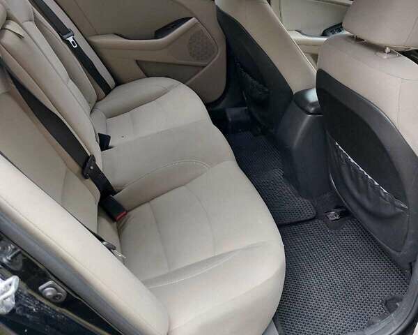 Черный Киа Оптима, объемом двигателя 2.36 л и пробегом 200 тыс. км за 7200 $, фото 6 на Automoto.ua