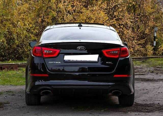 Черный Киа Оптима, объемом двигателя 2 л и пробегом 74 тыс. км за 5800 $, фото 7 на Automoto.ua