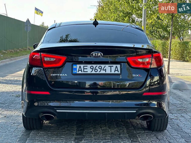 Черный Киа Оптима, объемом двигателя 2 л и пробегом 154 тыс. км за 13700 $, фото 5 на Automoto.ua