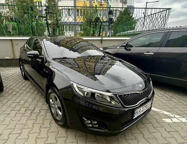 Черный Киа Оптима, объемом двигателя 1.7 л и пробегом 270 тыс. км за 12000 $, фото 9 на Automoto.ua