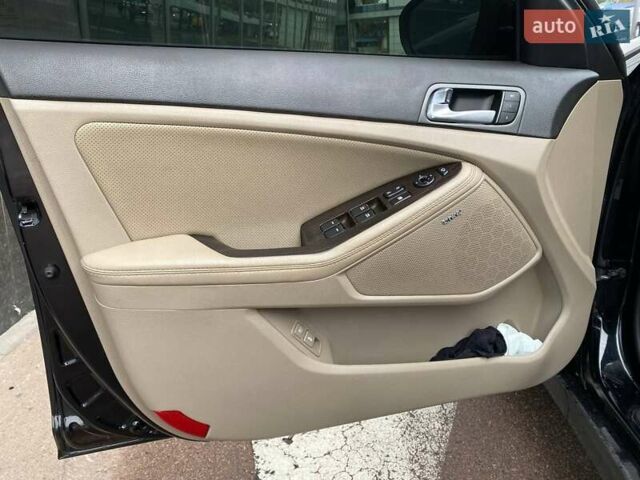 Черный Киа Оптима, объемом двигателя 2.4 л и пробегом 193 тыс. км за 8999 $, фото 15 на Automoto.ua