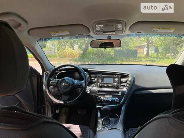Черный Киа Оптима, объемом двигателя 2.36 л и пробегом 265 тыс. км за 11000 $, фото 5 на Automoto.ua
