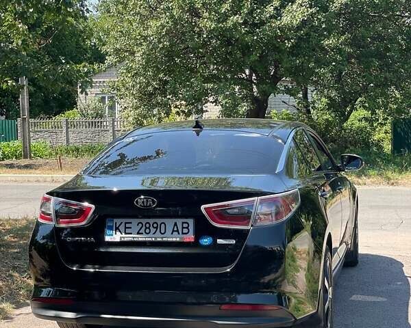 Черный Киа Оптима, объемом двигателя 2.36 л и пробегом 265 тыс. км за 11000 $, фото 2 на Automoto.ua