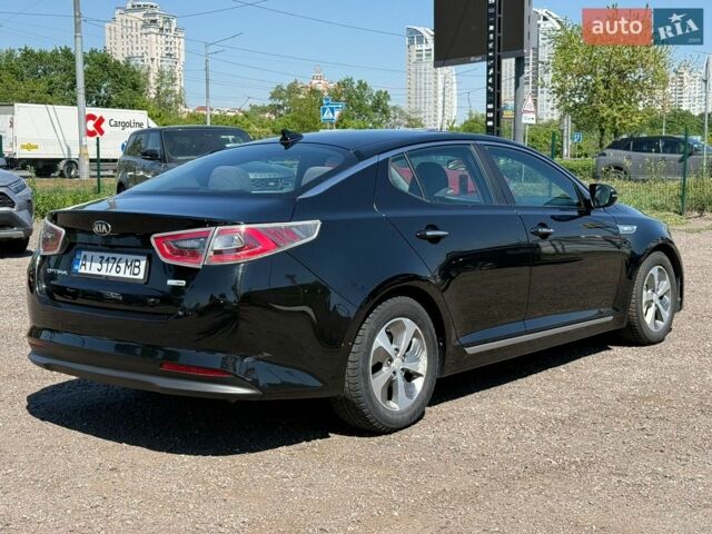 Черный Киа Оптима, объемом двигателя 2.36 л и пробегом 143 тыс. км за 12700 $, фото 5 на Automoto.ua
