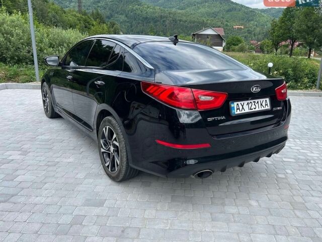 Чорний Кіа Оптіма, об'ємом двигуна 2 л та пробігом 130 тис. км за 8700 $, фото 2 на Automoto.ua