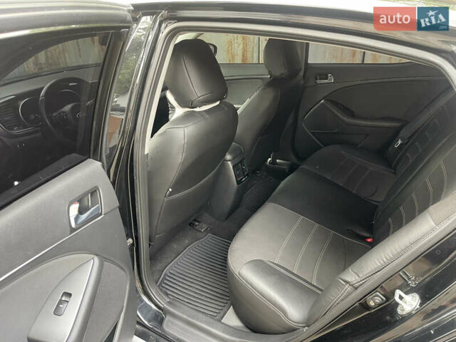 Черный Киа Оптима, объемом двигателя 2.36 л и пробегом 200 тыс. км за 9000 $, фото 5 на Automoto.ua