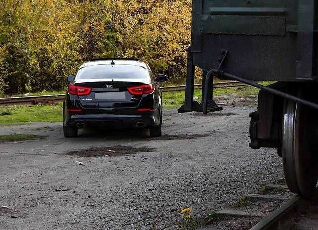 Черный Киа Оптима, объемом двигателя 2 л и пробегом 74 тыс. км за 5800 $, фото 6 на Automoto.ua