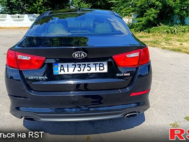 Черный Киа Оптима, объемом двигателя 2.4 л и пробегом 107 тыс. км за 11700 $, фото 5 на Automoto.ua