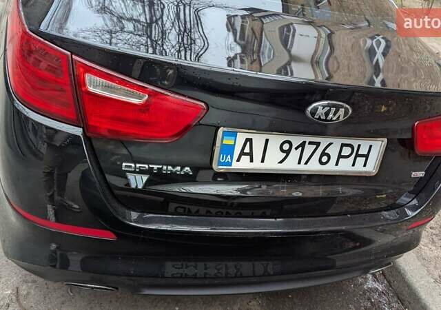Черный Киа Оптима, объемом двигателя 2.36 л и пробегом 190 тыс. км за 11000 $, фото 1 на Automoto.ua