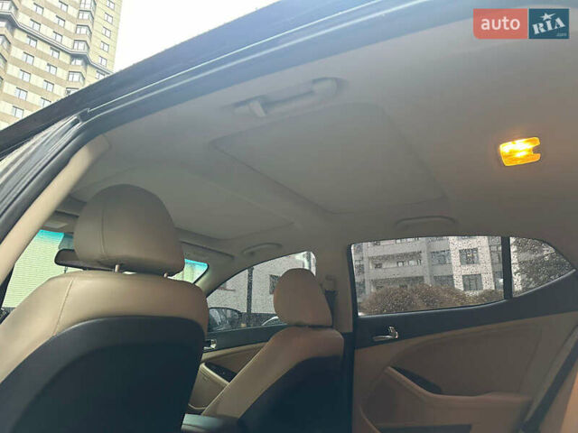 Черный Киа Оптима, объемом двигателя 2.4 л и пробегом 150 тыс. км за 9700 $, фото 11 на Automoto.ua