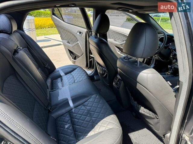 Черный Киа Оптима, объемом двигателя 2 л и пробегом 221 тыс. км за 11400 $, фото 11 на Automoto.ua
