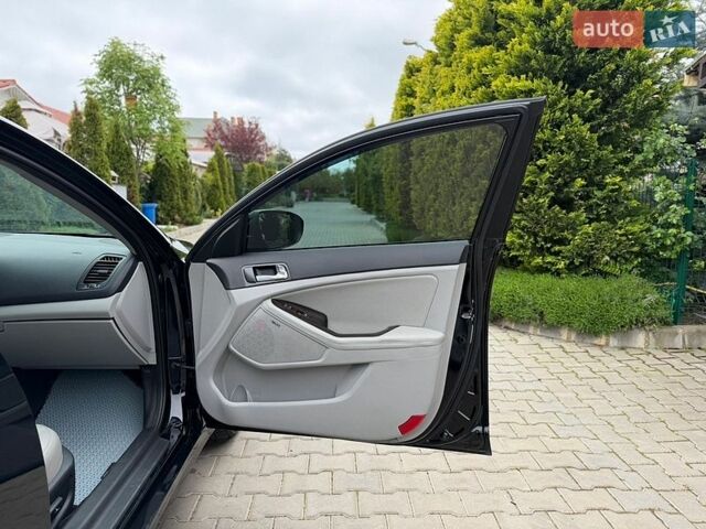 Черный Киа Оптима, объемом двигателя 2.36 л и пробегом 116 тыс. км за 11200 $, фото 33 на Automoto.ua