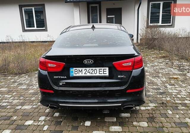 Чорний Кіа Оптіма, об'ємом двигуна 2 л та пробігом 104 тис. км за 11600 $, фото 6 на Automoto.ua