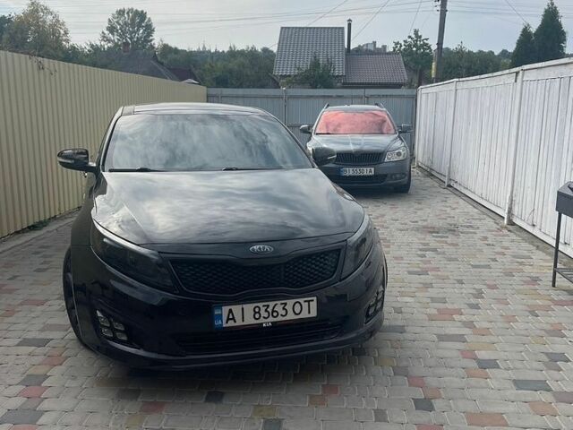 Чорний Кіа Оптіма, об'ємом двигуна 2 л та пробігом 145 тис. км за 11750 $, фото 2 на Automoto.ua