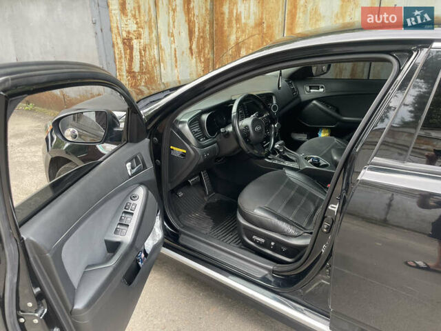 Черный Киа Оптима, объемом двигателя 2.36 л и пробегом 200 тыс. км за 9000 $, фото 4 на Automoto.ua