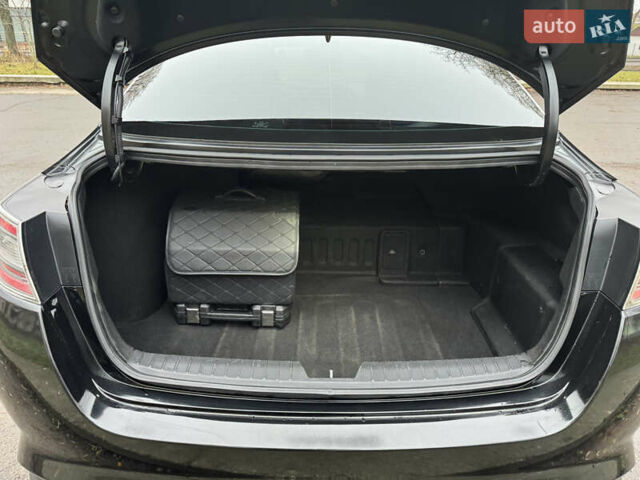Чорний Кіа Оптіма, об'ємом двигуна 2.36 л та пробігом 168 тис. км за 10999 $, фото 26 на Automoto.ua
