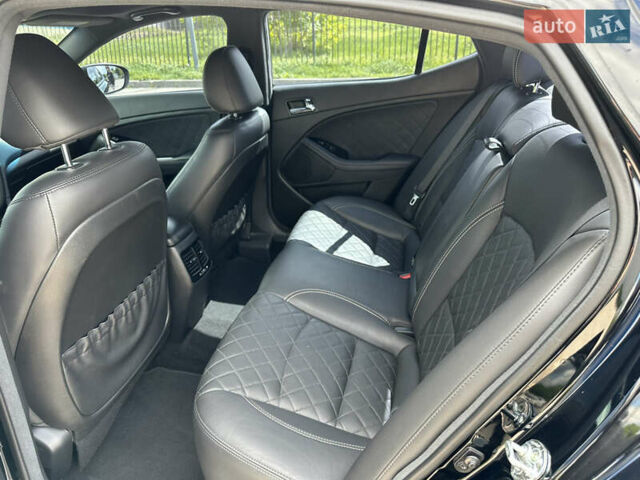 Черный Киа Оптима, объемом двигателя 2 л и пробегом 180 тыс. км за 13300 $, фото 11 на Automoto.ua