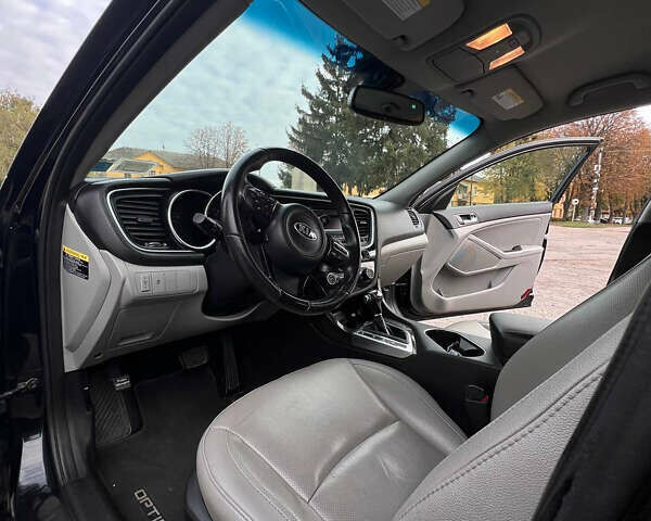 Кіа Оптіма 2014 у Ватутіне на Automoto.ua Чорний Кіа Оптіма, об'ємом двигуна 2.4 л та пробігом 180 тис. км за 9500 $, фото 47 на Automoto.ua