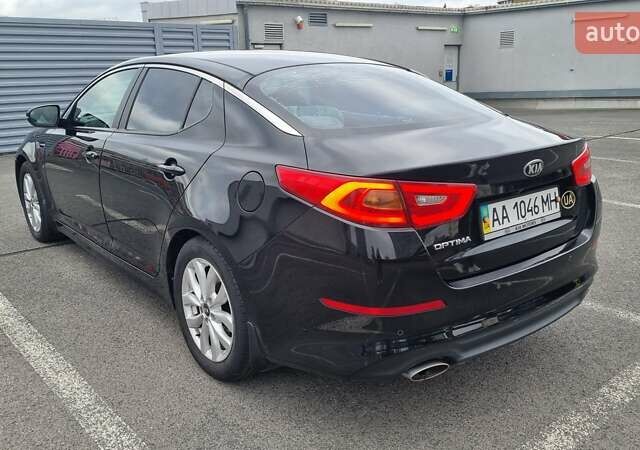 Чорний Кіа Оптіма, об'ємом двигуна 2.36 л та пробігом 216 тис. км за 10800 $, фото 4 на Automoto.ua
