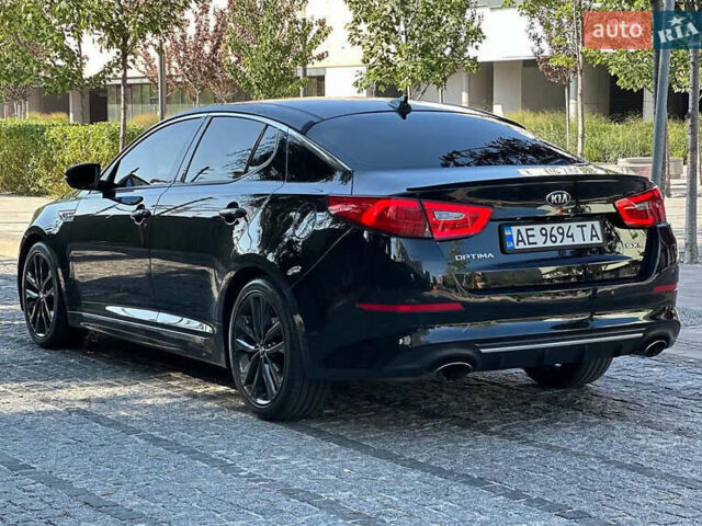 Черный Киа Оптима, объемом двигателя 2 л и пробегом 154 тыс. км за 13700 $, фото 4 на Automoto.ua