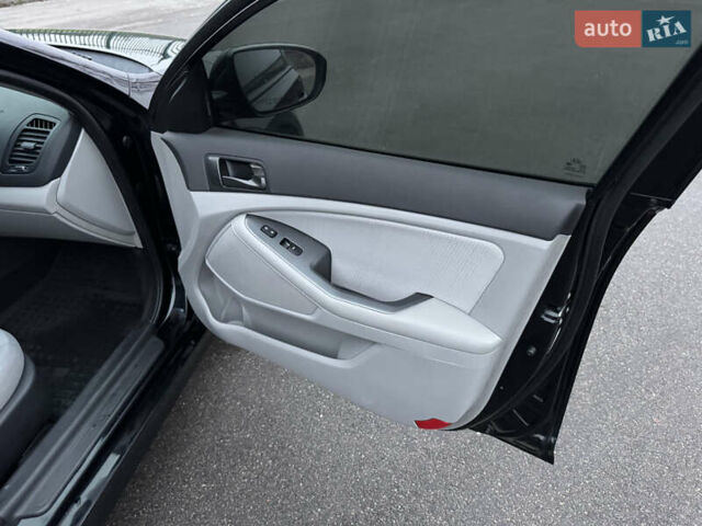 Черный Киа Оптима, объемом двигателя 2.36 л и пробегом 183 тыс. км за 8750 $, фото 31 на Automoto.ua