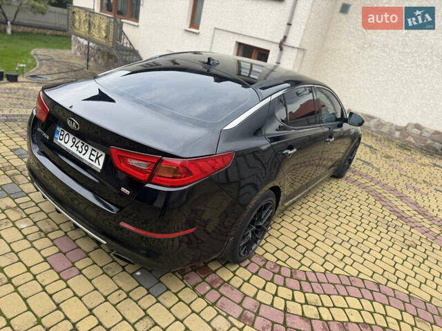 Чорний Кіа Оптіма, об'ємом двигуна 2 л та пробігом 280 тис. км за 9890 $, фото 6 на Automoto.ua