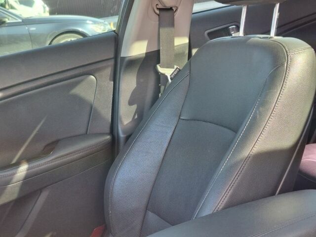 Черный Киа Оптима, объемом двигателя 2.4 л и пробегом 175 тыс. км за 10300 $, фото 15 на Automoto.ua