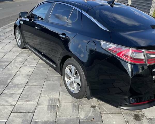 Черный Киа Оптима, объемом двигателя 2.36 л и пробегом 205 тыс. км за 11000 $, фото 3 на Automoto.ua