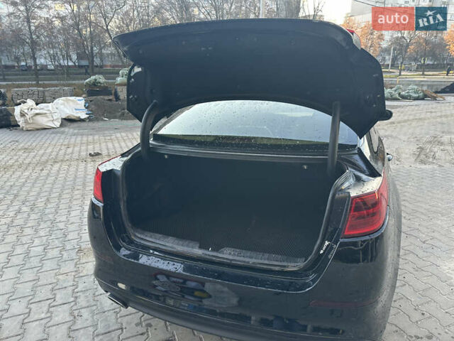 Черный Киа Оптима, объемом двигателя 2.4 л и пробегом 100 тыс. км за 8500 $, фото 9 на Automoto.ua