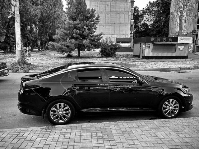 Черный Киа Оптима, объемом двигателя 2.4 л и пробегом 170 тыс. км за 8900 $, фото 1 на Automoto.ua