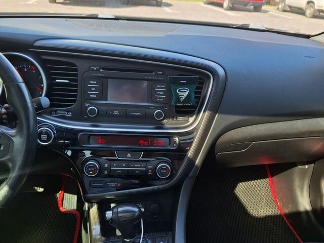 Черный Киа Оптима, объемом двигателя 2.4 л и пробегом 175 тыс. км за 10300 $, фото 8 на Automoto.ua