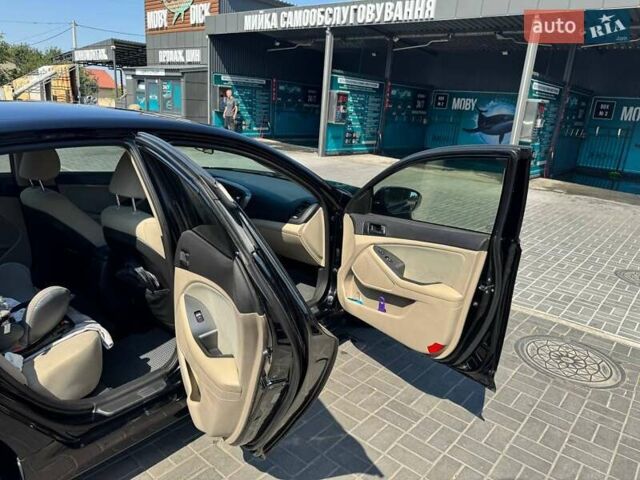 Черный Киа Оптима, объемом двигателя 2.36 л и пробегом 84 тыс. км за 11300 $, фото 6 на Automoto.ua