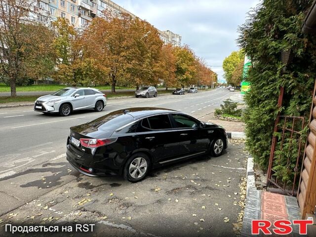Черный Киа Оптима, объемом двигателя 2.4 л и пробегом 74 тыс. км за 11000 $, фото 8 на Automoto.ua