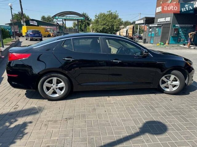 Черный Киа Оптима, объемом двигателя 2.36 л и пробегом 84 тыс. км за 11300 $, фото 1 на Automoto.ua