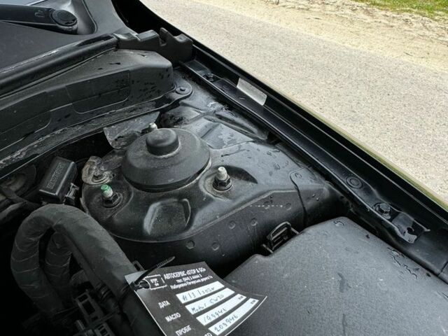 Черный Киа Оптима, объемом двигателя 0.24 л и пробегом 200 тыс. км за 10000 $, фото 4 на Automoto.ua
