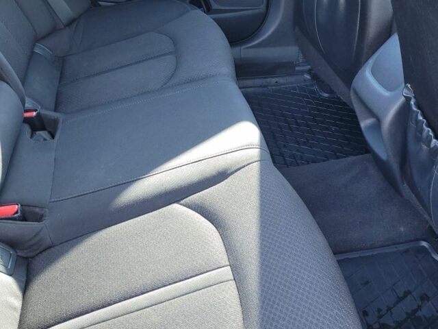 Черный Киа Оптима, объемом двигателя 2 л и пробегом 248 тыс. км за 12292 $, фото 5 на Automoto.ua