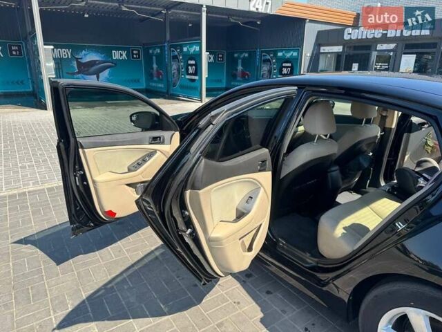 Черный Киа Оптима, объемом двигателя 2.36 л и пробегом 84 тыс. км за 11300 $, фото 4 на Automoto.ua