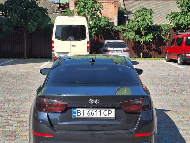 Черный Киа Оптима, объемом двигателя 2.4 л и пробегом 175 тыс. км за 10300 $, фото 3 на Automoto.ua