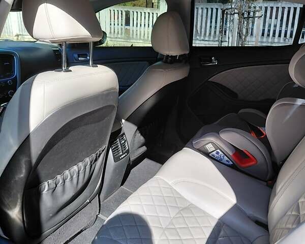 Черный Киа Оптима, объемом двигателя 2 л и пробегом 155 тыс. км за 15200 $, фото 14 на Automoto.ua