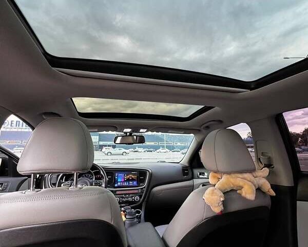 Черный Киа Оптима, объемом двигателя 2.36 л и пробегом 104 тыс. км за 12700 $, фото 12 на Automoto.ua