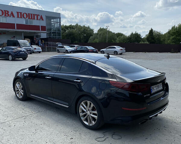 Черный Киа Оптима, объемом двигателя 2 л и пробегом 132 тыс. км за 12300 $, фото 3 на Automoto.ua