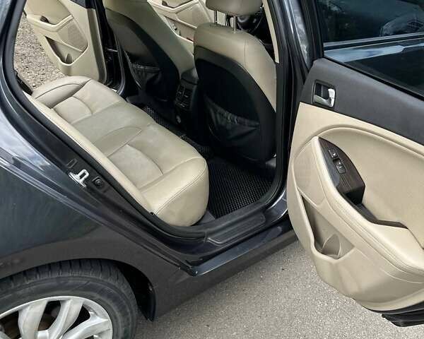 Черный Киа Оптима, объемом двигателя 2.36 л и пробегом 180 тыс. км за 9300 $, фото 8 на Automoto.ua