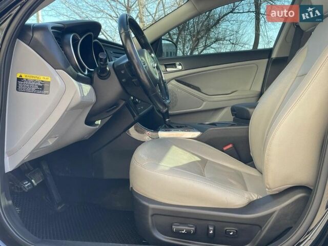 Чорний Кіа Оптіма, об'ємом двигуна 2.36 л та пробігом 109 тис. км за 10800 $, фото 12 на Automoto.ua