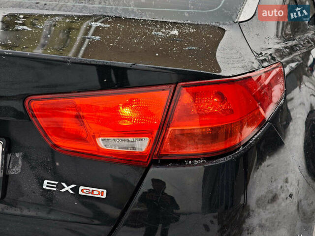 Черный Киа Оптима, объемом двигателя 2.4 л и пробегом 277 тыс. км за 10290 $, фото 10 на Automoto.ua